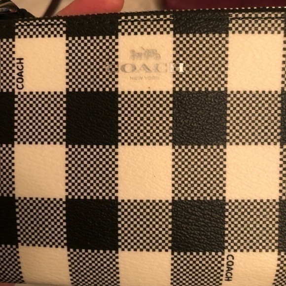 Coach black creamy white checkered wristlet bag